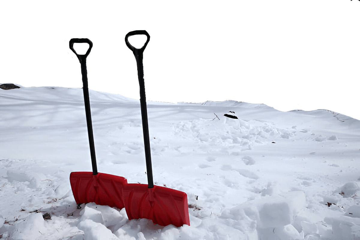 man pushing snow shovel for clearing snow build up