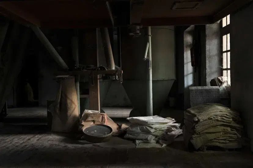 Abandoned Industrial Room with Deteriorated Items