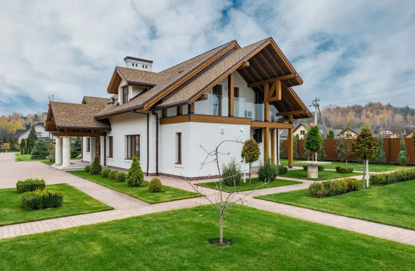Modern house with manicured lawn and landscaping