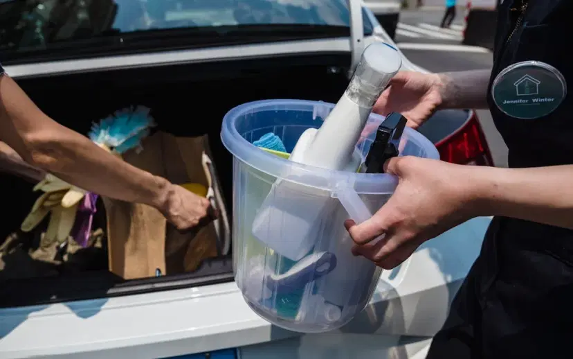 Professional cleaning supplies in storage bucket