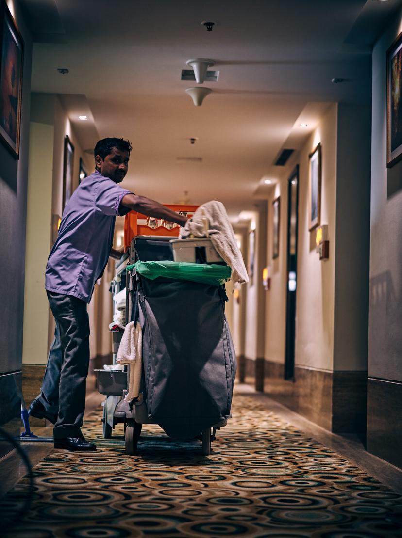 a hotel cleaner cleaning when someone is not in the home for a house cleaning service