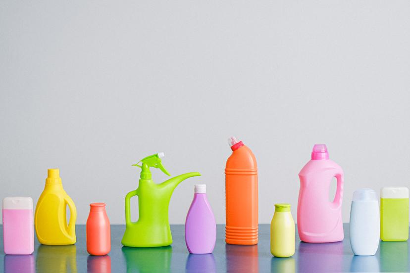 cleaning supplies lined up in different colors