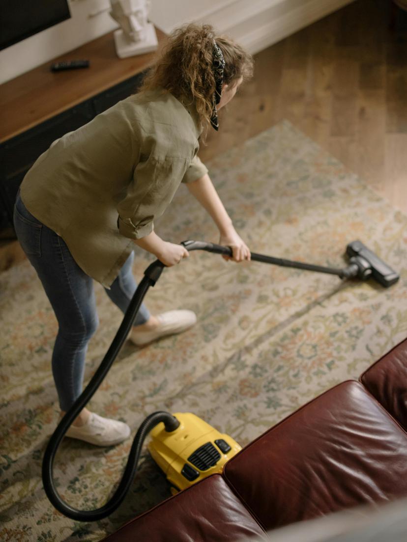 apartment getting cleaned by vacuum